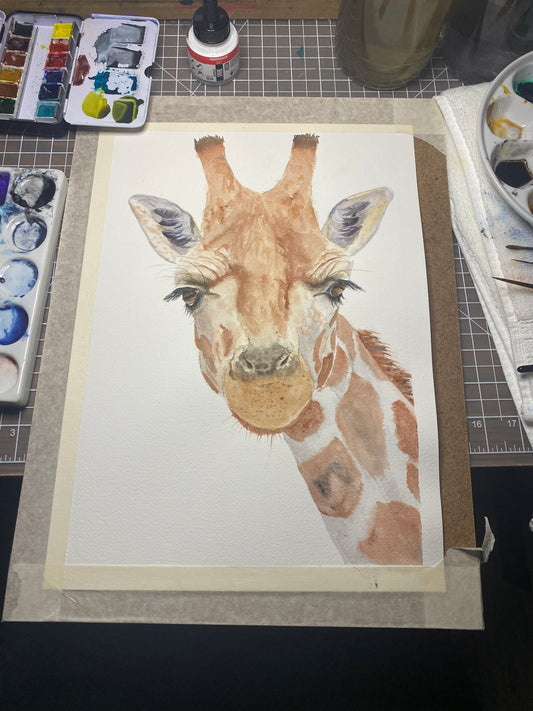 Watercolour Giraffe Painting on a easel